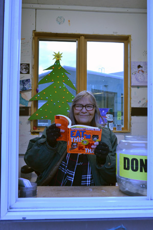Judy reading the the VCRS wecome booth